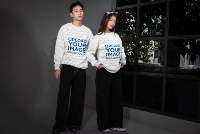 Sweatshirt Mockup Featuring a Man and a Woman With Alternative Styles Posing Near a Window m54159