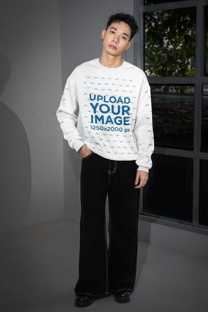 Sweatshirt Mockup Featuring a Man Standing With a Serious Look Near a Window m54158