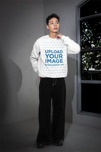 Sweatshirt Mockup of a Man With an Alternative Look Standing in a Room With a Window m54154