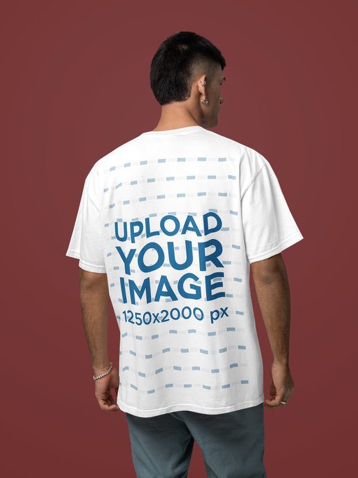 Back-View Comfort Colors Mockup of a Man Wearing a T-Shirt in a Studio