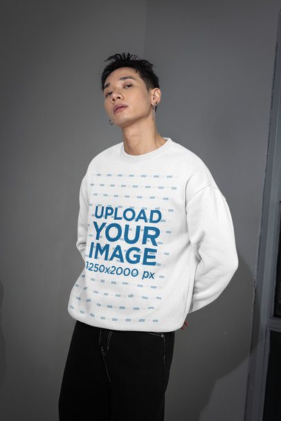 Sweatshirt Mockup of a Man Posing With an Alternative Style in a Room m54156
