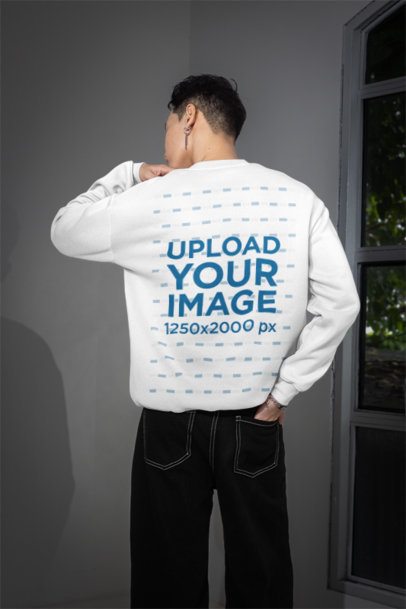 Back-View Mockup Featuring a Man Wearing a Sweatshirt in a Room With a Window m54157