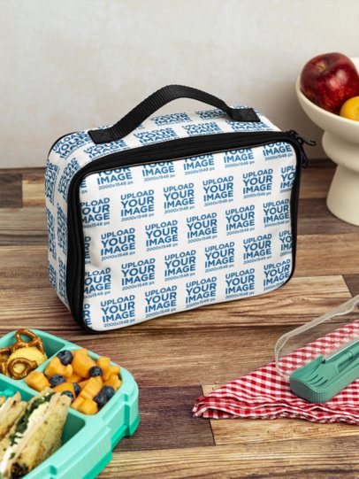 Lunch Bag Mockup Featuring a Wooden Table With Snacks m57820