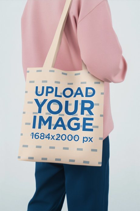 Mockup of an AI-Generated Person Carrying a Sublimated Tote Bag in a Studio Setting