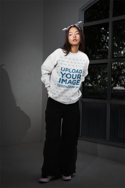Sweatshirt Mockup Featuring a Woman Standing in a Room With an Alternative Outfit m54151