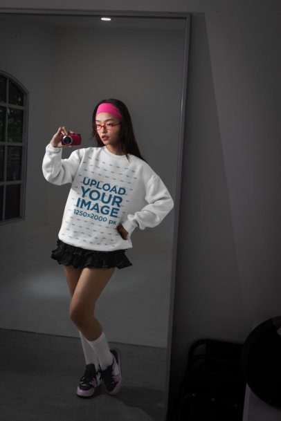 Sweatshirt Mockup of an Alternative-Styled Woman Taking a Picture in Front of a Mirror m54175