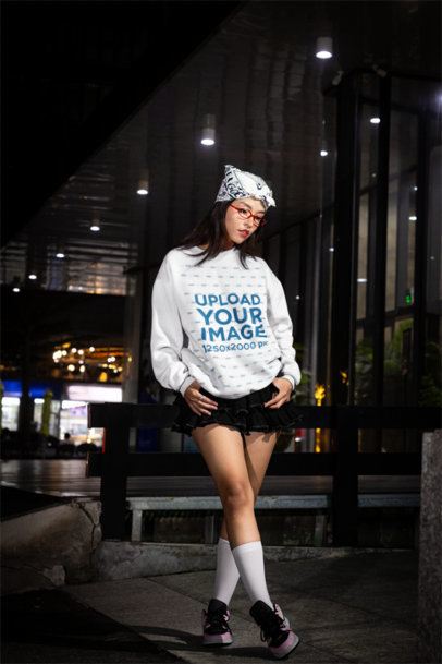Sweatshirt Mockup of an Alternative-Styled Woman Posing in the Street at Night m54204