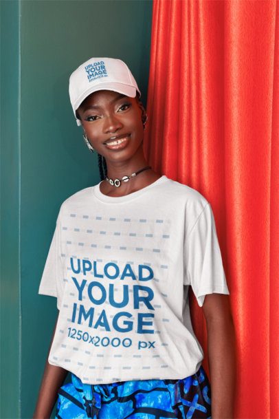 Dad Hat Mockup Featuring a Smiling Woman in a Tee Posing in a Colorful Setting