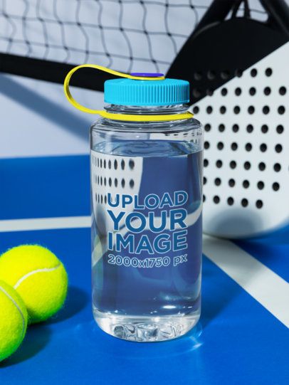 Narrow Mouth Plastic Water Bottle Mockup Featuring a Padel Ball and a Racket