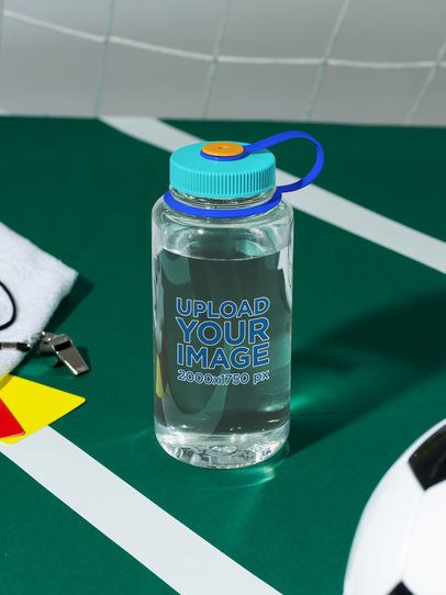 Mockup of a Wide Mouth Water Bottle Placed on a Soccer Field