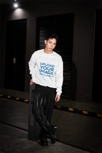 Crewneck Sweatshirt Mockup of a Man Standing on the Sidewalk With an Alternative Style m54197