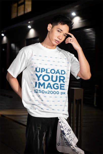 Oversized T-Shirt Mockup of a Man With an Alternative Outfit Posing in the Street m54193