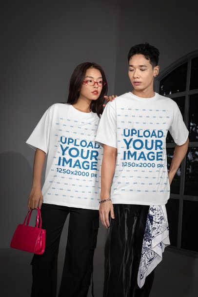 Oversized T-Shirt Mockup Featuring a Woman Posing With a Man in Alternative Outfits m54183