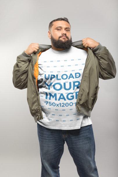 Plus Size T-Shirt Mockup of a Man in a Studio