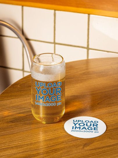 Mockup Featuring a Coaster and a Beer Can Glass Placed on a Wooden Table m58065