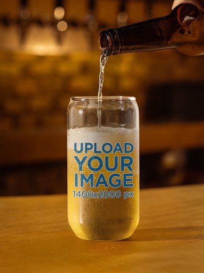 Mockup Featuring a Can Glass Being Poured With Beer in a Bar m58057