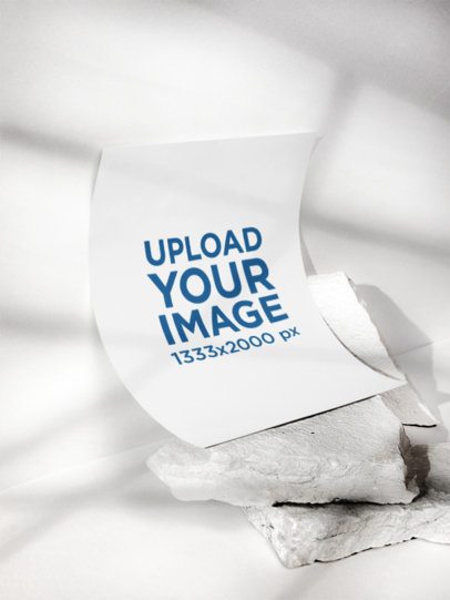 Mockup of a Poster Lying Over Some Rocks