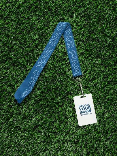 Mockup of a Lanyard With a Badge Holder Lying on the Grass m58161