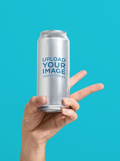 Mockup of a Person's Hand Holding a Can in a Studio m58414
