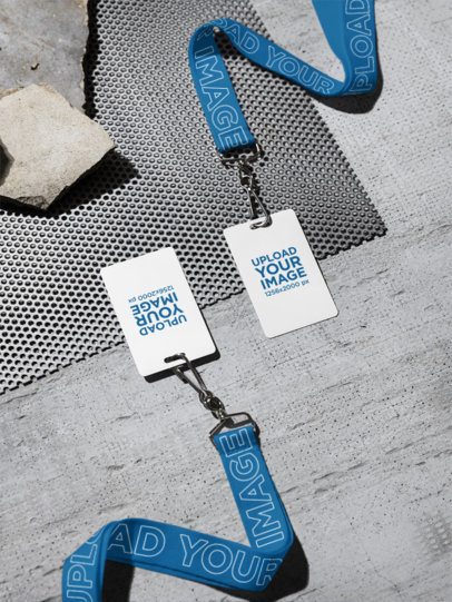 Mockup of Two Lanyards With Badge Holders Lying on the Urban Floor m58168