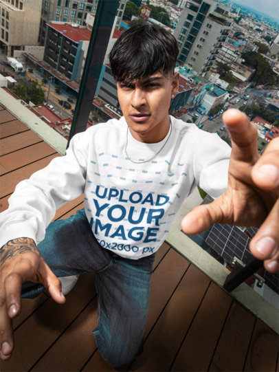 Comfort Colors Sweatshirt Mockup Featuring a Tattooed Man Posing on a Rooftop m57612