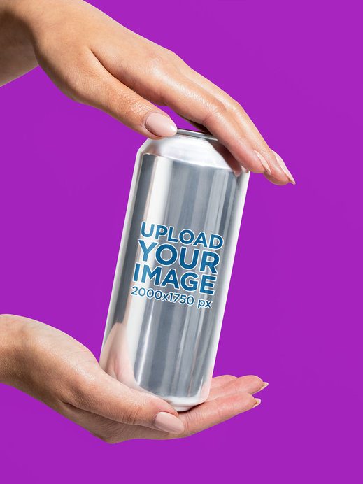 Mockup Featuring a Pair of Woman's Hands Holding a 16 Oz Can