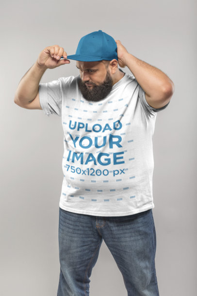 Plus Size T-Shirt Mockup of a Man Adjusting his Hat