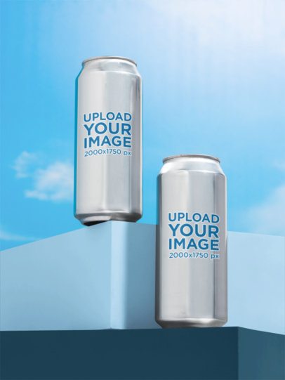 Mockup of Two 16 Oz Cans Placed Against the Sky m58404