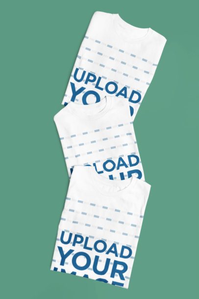 Mockup of Three Gildan T-Shirts Lying on a Colorful Setting m52178