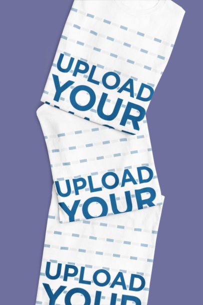 Mockup of Three-Folded Gildan Round-Neck T-Shirts Placed on a Flat Color Surface m52179