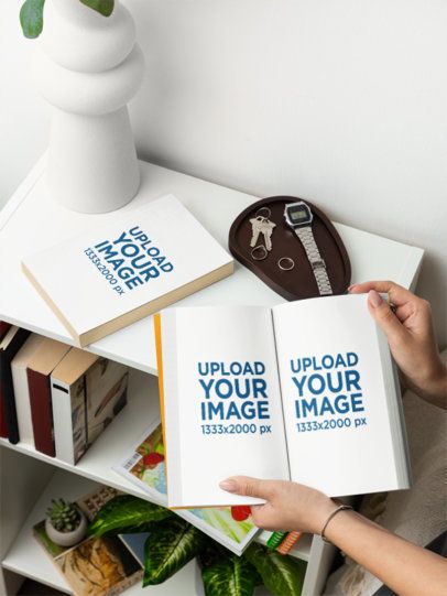 Mockup Featuring a Woman Holding an Open Book Near a Bookshelf m58560
