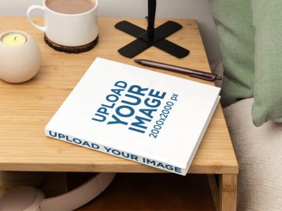 Mockup of a Hardcover Book Lying on a Wooden Night Table m58556