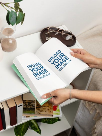 Mockup of a Woman Opening a Book in a Bedroom