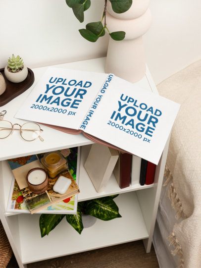 Mockup Featuring an Open Hardcover Book Placed on a Nightstand