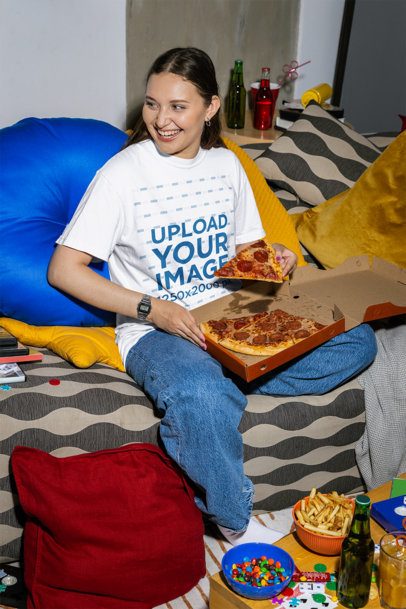 Comfort Colors T-Shirt Mockup Featuring a Smiling Woman on a Couch Eating Pizza m58534