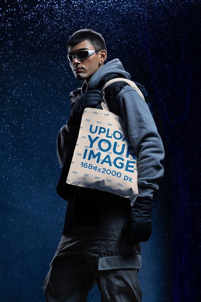 Mockup of a Man Carrying a Tote Bag in a Winter-Themed Outfit m59230