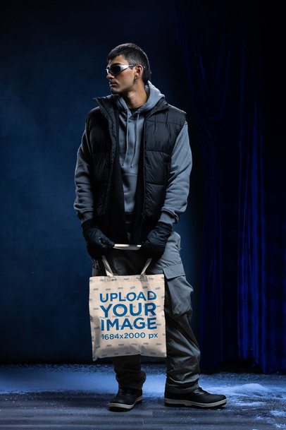Tote Bag Mockup Featuring a Serious Man Wearing Winter Clothes m59231