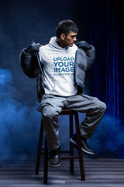 Comfort Colors 1567 Hoodie Mockup Featuring a Man Taking Off His Winter Jacket m59238