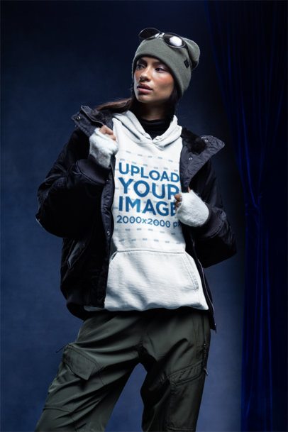 Comfort Colors 1567 Hoodie Mockup Featuring a Woman With a Serious Look Posing in a Winter Setting m59244