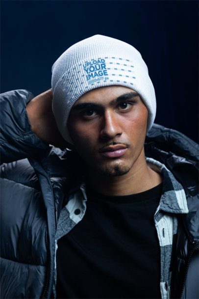 Yupoong 1501KC Beanie Mockup of a Man Posing in a Winter-Themed Set