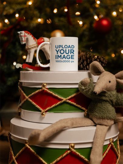Mockup of a Coffee Mug Placed Over Nice Christmas Decorations
