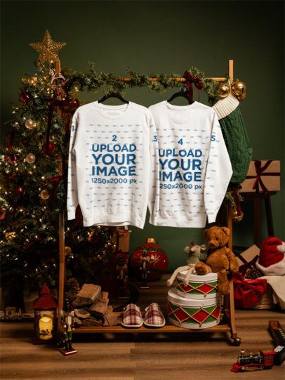 Comfort Colors 1566 Mockup Featuring Two Sweatshirts Hanging in a Christmas-Decorated Setting m59311