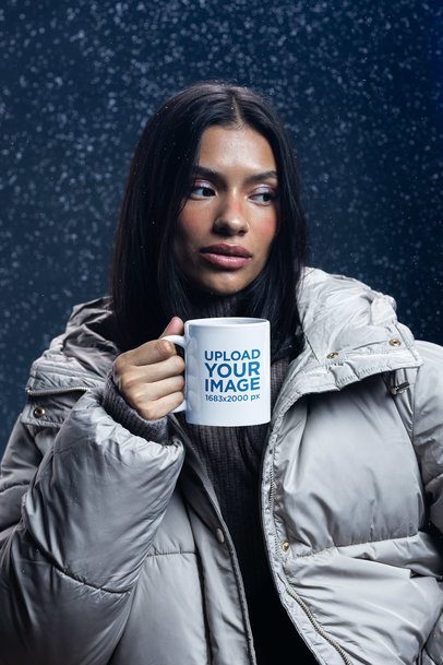 Mockup of a Serious Woman in a Winter Setting Holding a Coffee Mug m59235