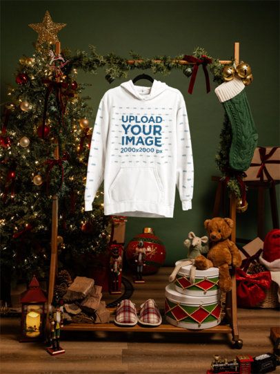Mockup of a Comfort Colors 1567 Garment-Dyed Hoodie on a Hanger in a Christmas-Decorated Room m59336