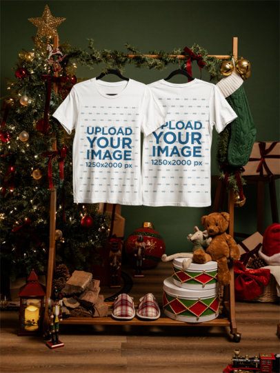 Mockup of Two Bella Canvas 6400 T-Shirts Hanging from a Christmas Garland m59325