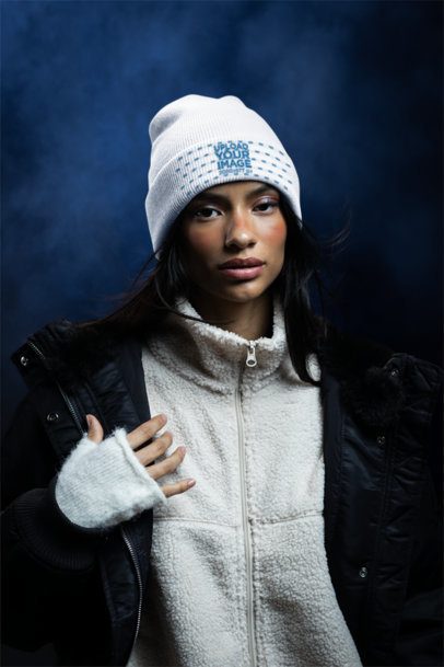 Winter-Themed Mockup Featuring a Serious Woman Wearing a Yupoong 1501KC Beanie