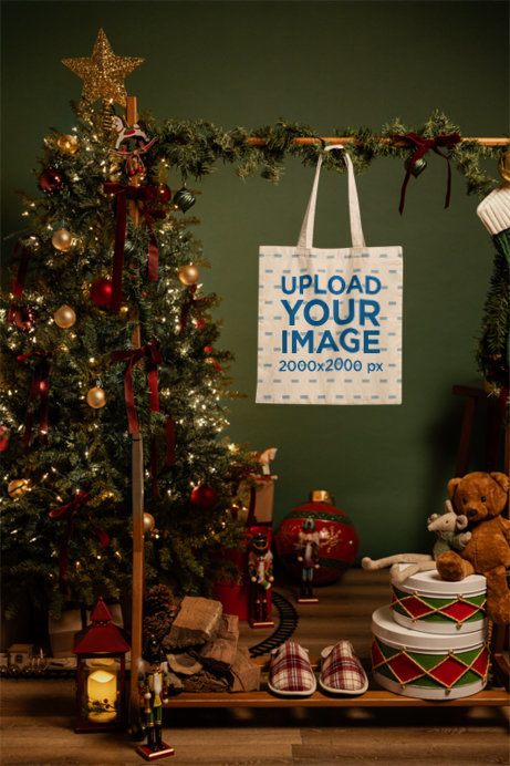 Mockup of a Tote Bag Hanging on a Christmas-Decorated Setting