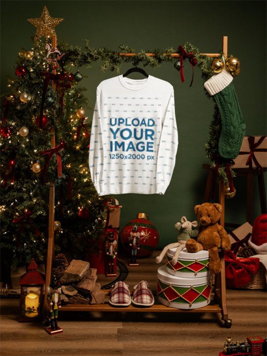 Comfort Colors 6014 Mockup Featuring a Long-Sleeve Tee Placed on a Hanger in a Xmas Setting