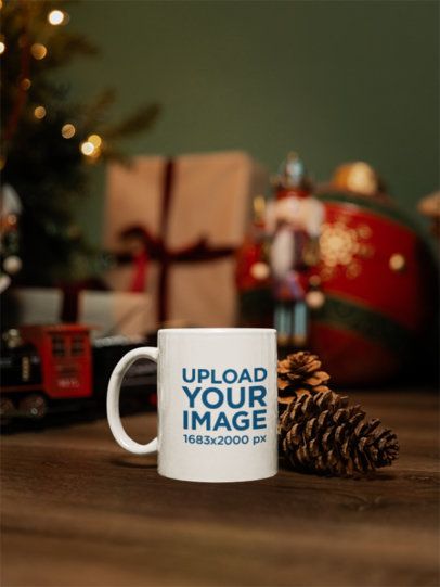 Christmas-Themed Mockup Featuring a Coffee Mug Placed on a Wooden Table m59335