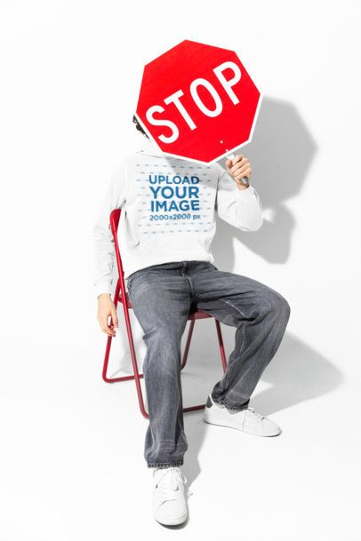 Comfort Colors 1567 Garment-Dyed Hoodie Mockup of a Guy Holding a Stop Sign  m59008